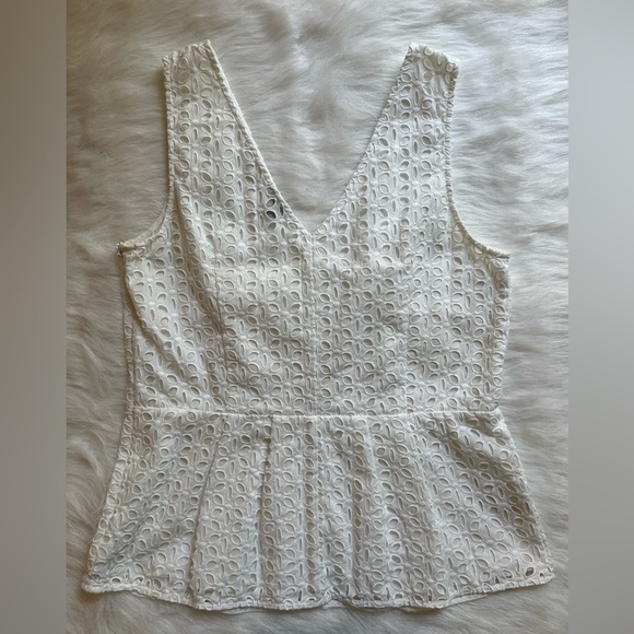 ANN TAYLOR. Used eyelet sleeveless top with ruffle bottom. - Picture 3 of 4